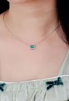 Collana con gemme Halo taglio smeraldo