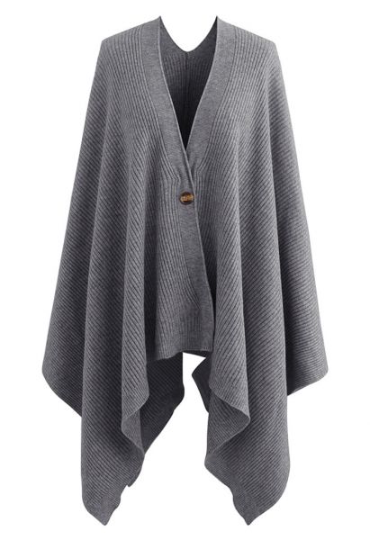 Mantella poncho in maglia a coste abbottonata in grigio