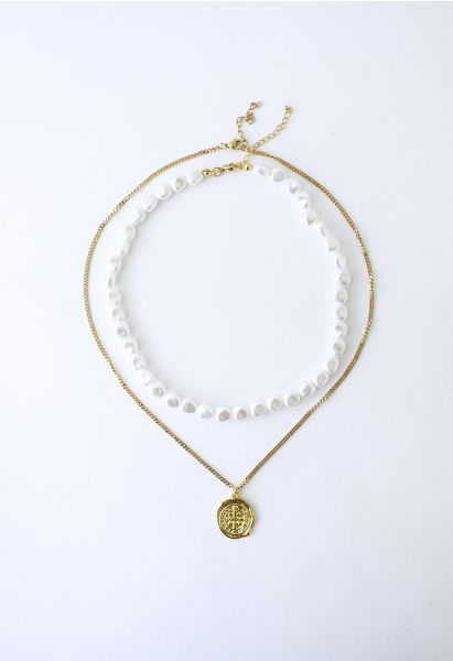 Collana di perle a strati con catena dorata alla moda