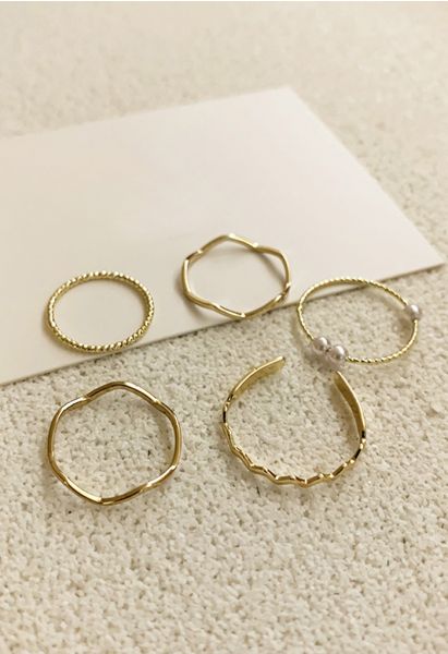 Anelli d'oro con perle semplici a cinque pezzi