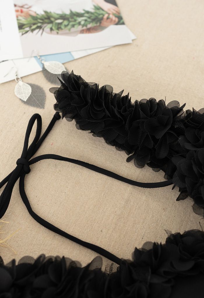 Costume da bagno intero con bretelle a fiori in rete di colore nero
