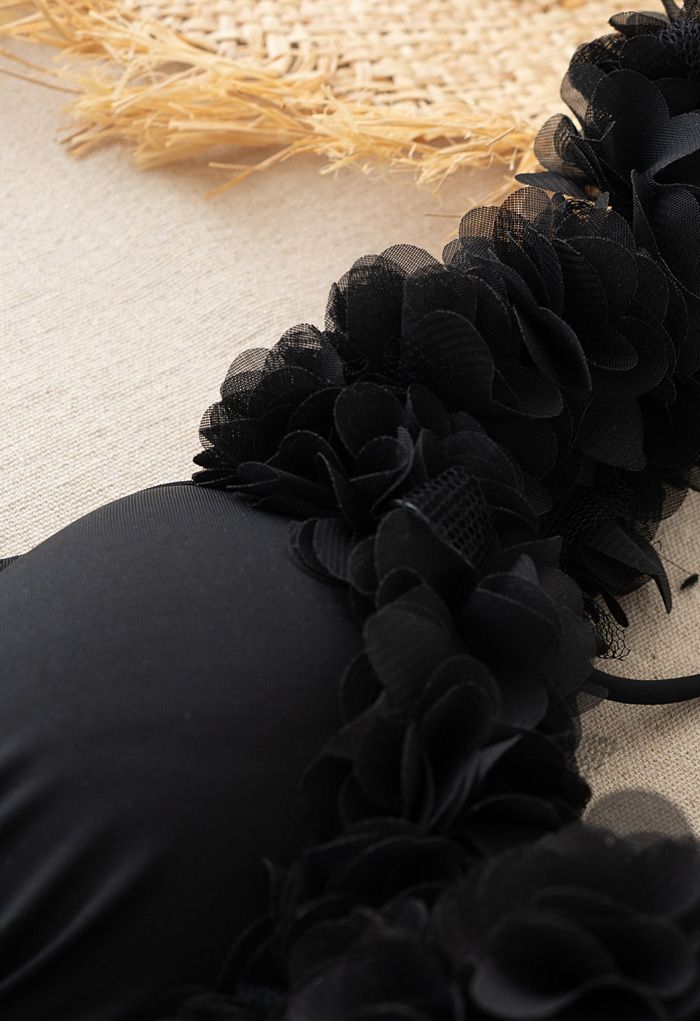 Costume da bagno intero con bretelle a fiori in rete di colore nero