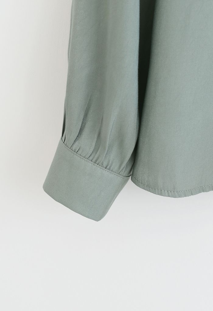 Camicia button down con fiocco luccicante in verde acqua