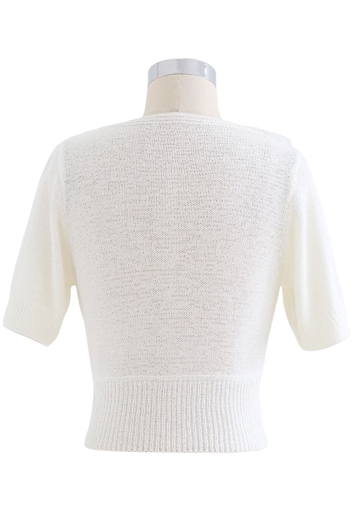 Top in maglia corto avvolgente con rivestimento in rete in bianco