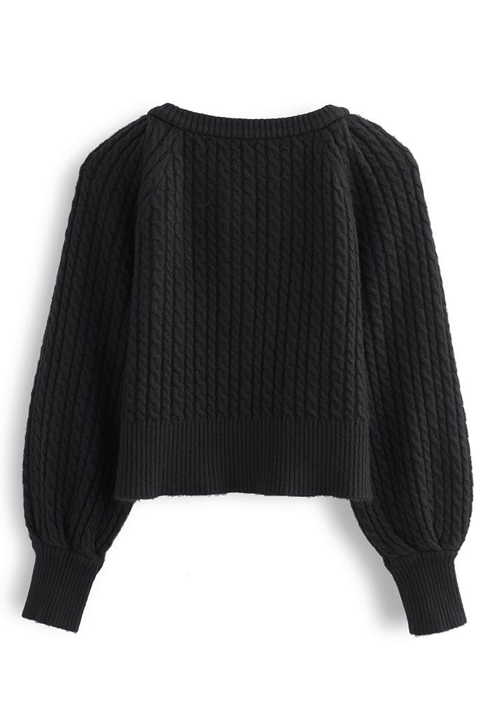 Cardigan corto abbottonato in maglia intrecciata in nero