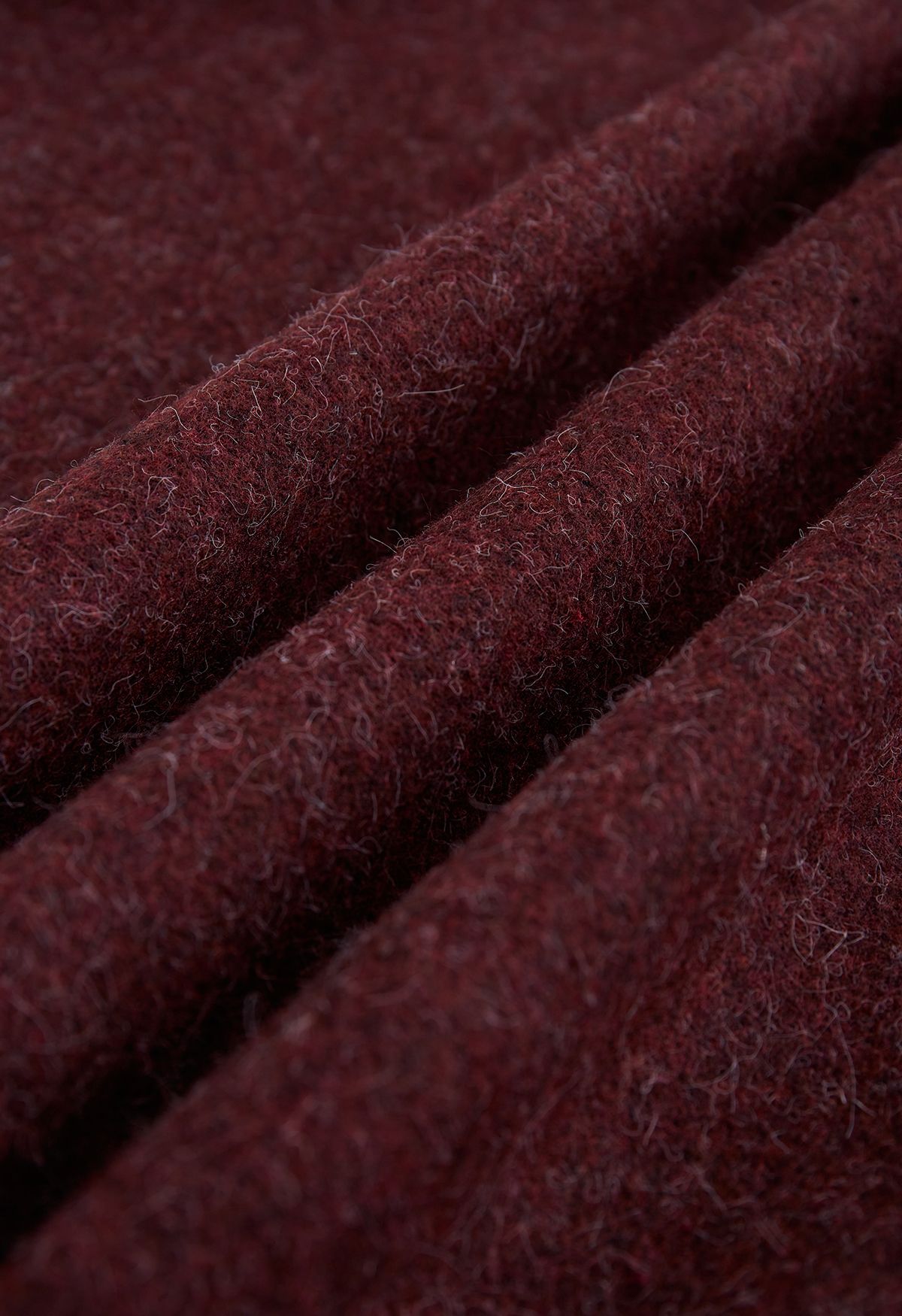 Poncho con cappuccio in pelliccia sintetica in misto lana bordeaux