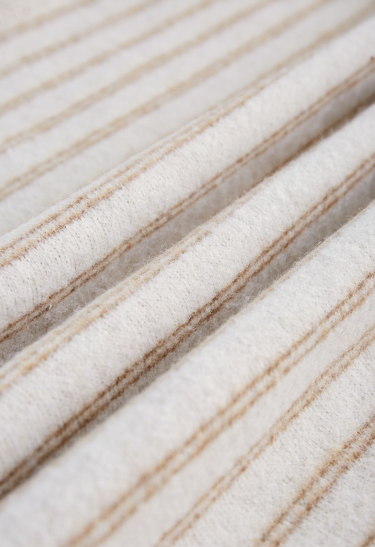 Poncho in pelliccia sintetica in misto lana a righe verticali