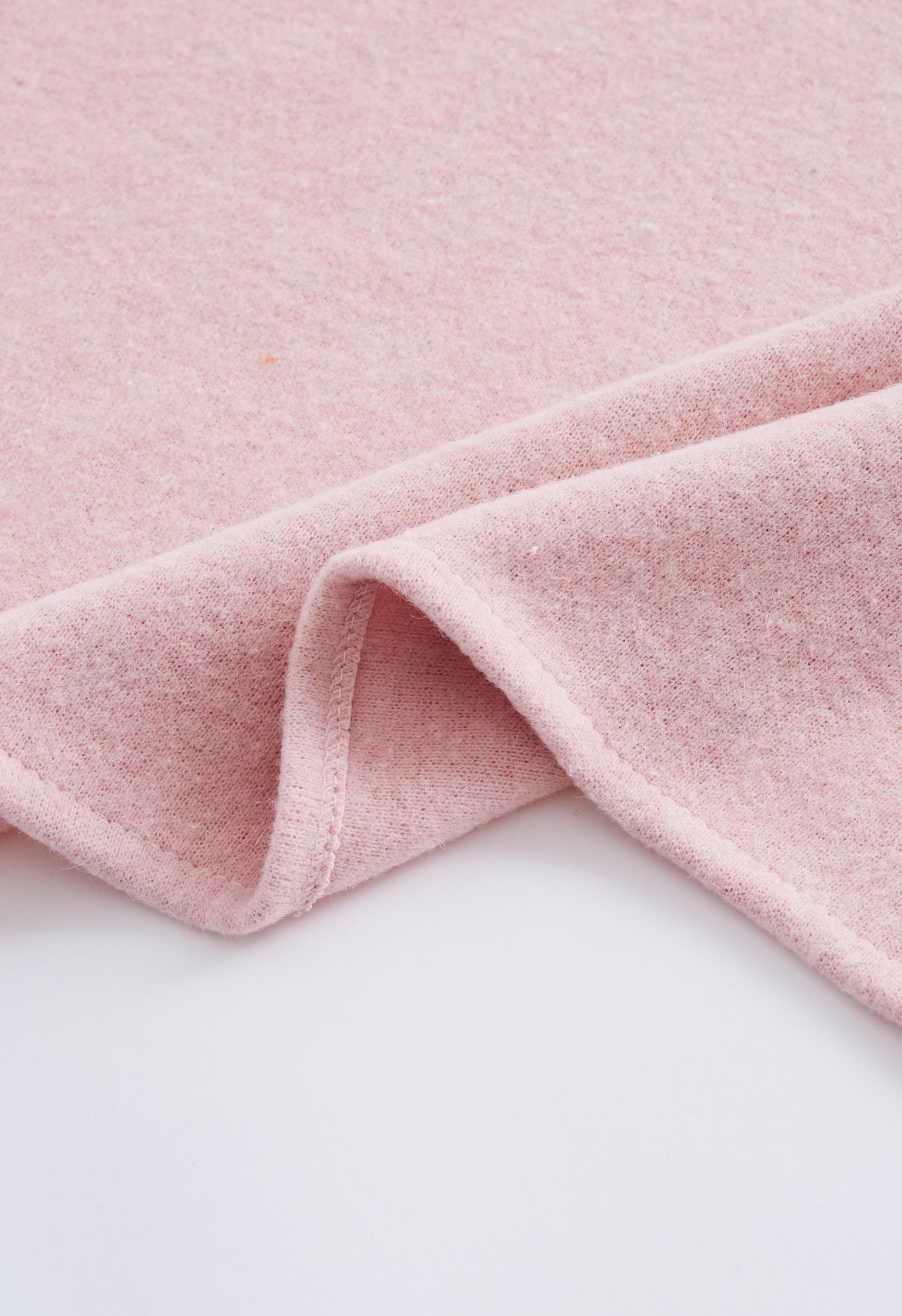 Poncho in pelliccia sintetica con fiocco da annodare in rosa