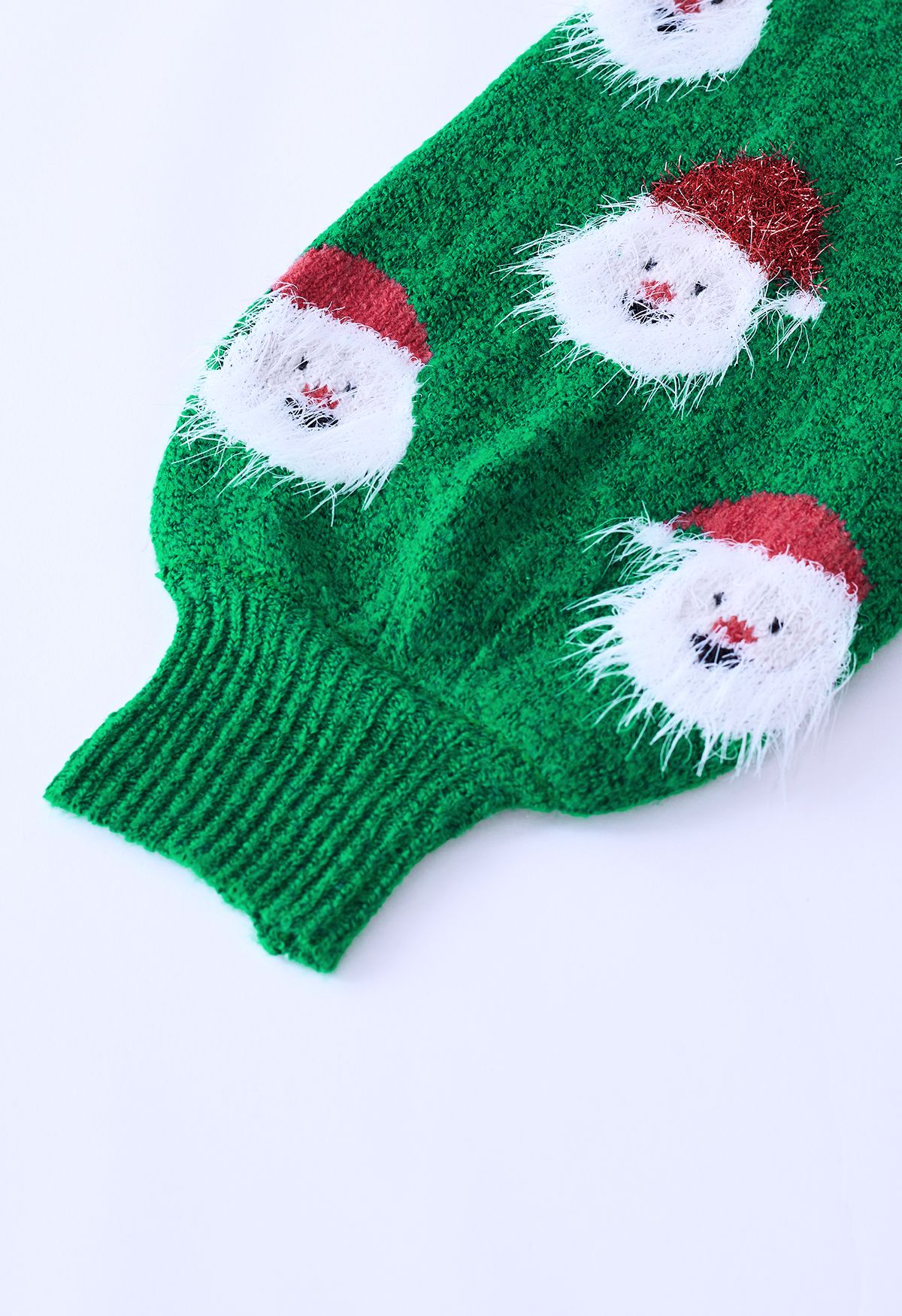 Top in maglia sfocata di Babbo Natale in verde