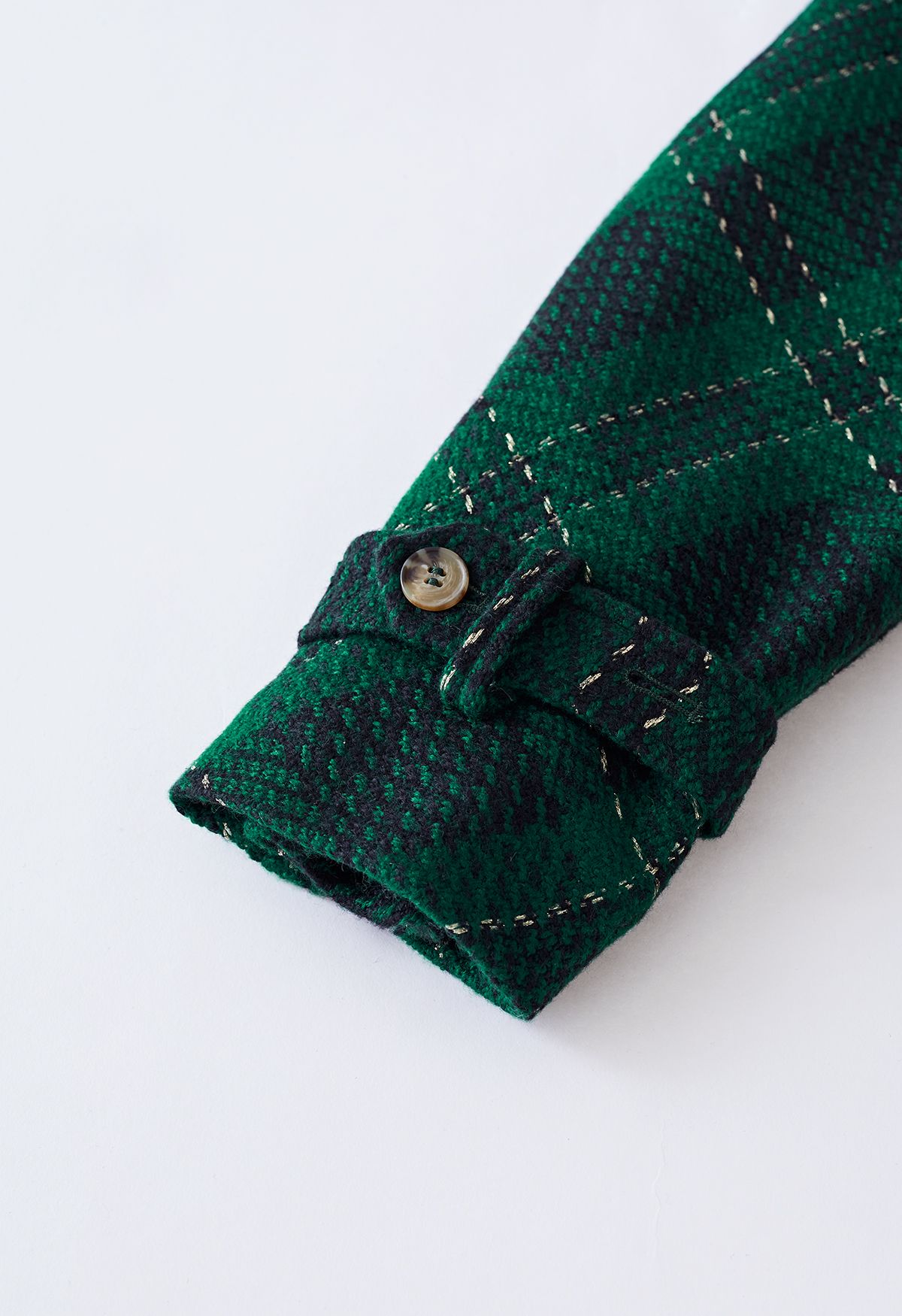 Giacca corta in tweed scozzese metallizzato e gonna a pieghe in verde