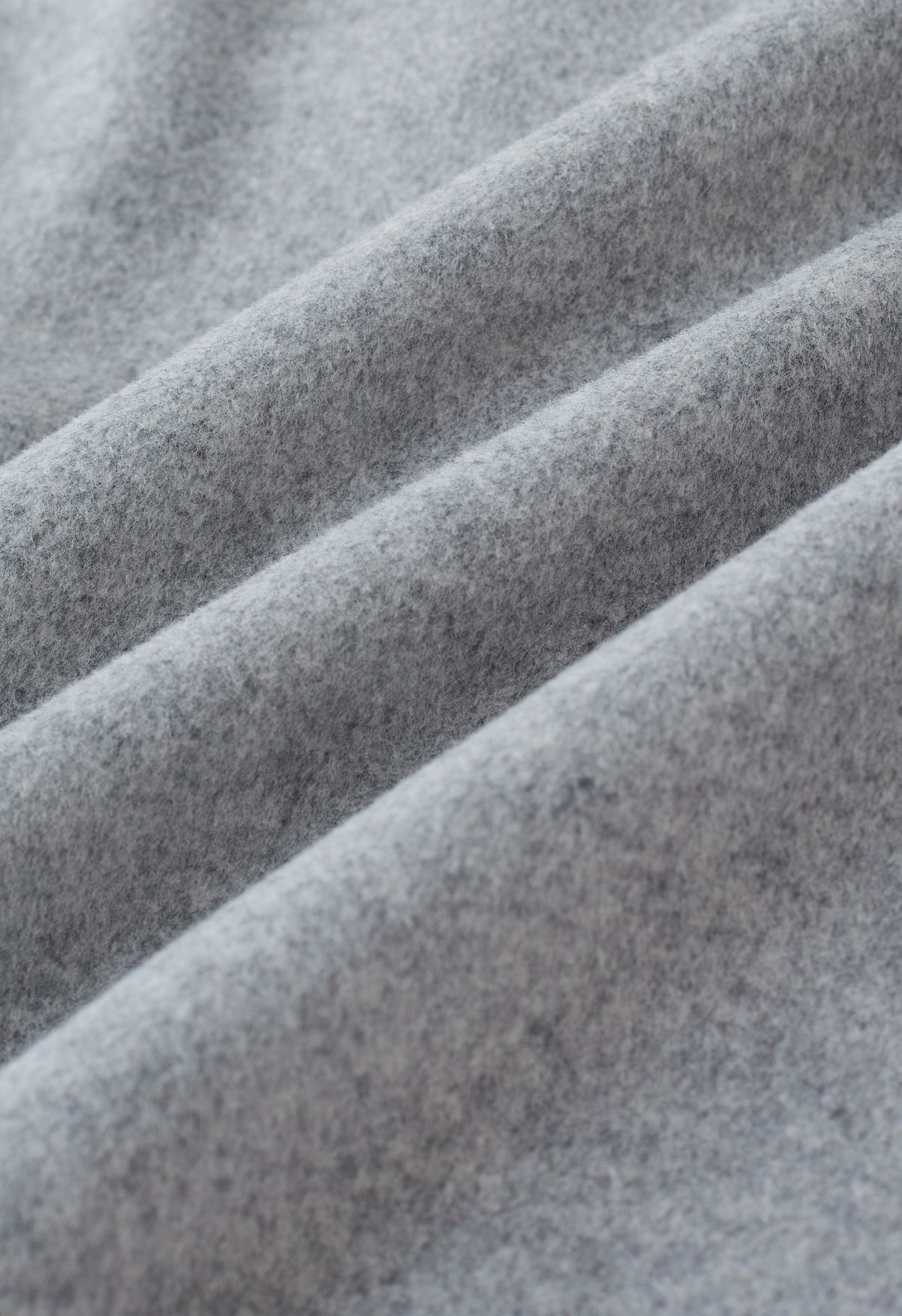 Blazer corto in misto lana e gilet con cintura in grigio