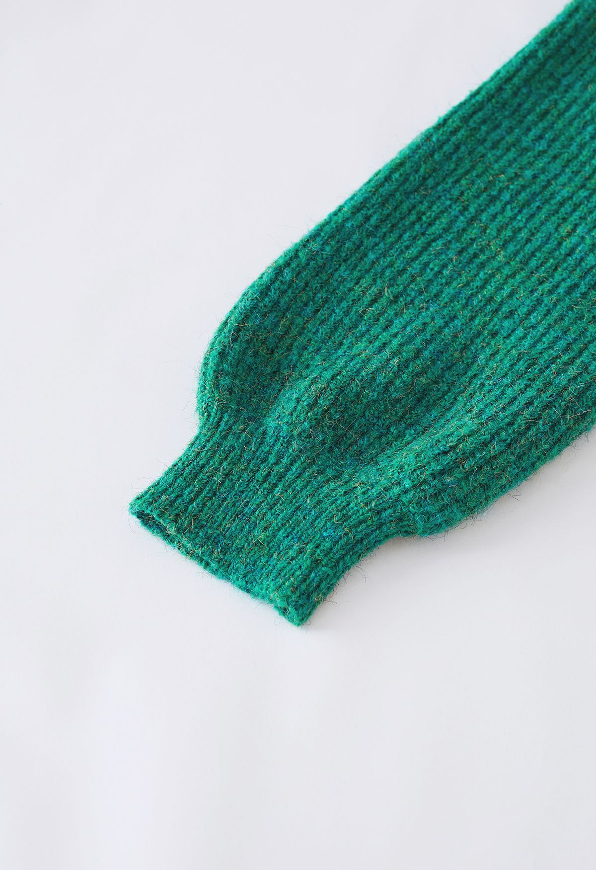 Maglione a costine con maniche a sbuffo in maglia mista in verde