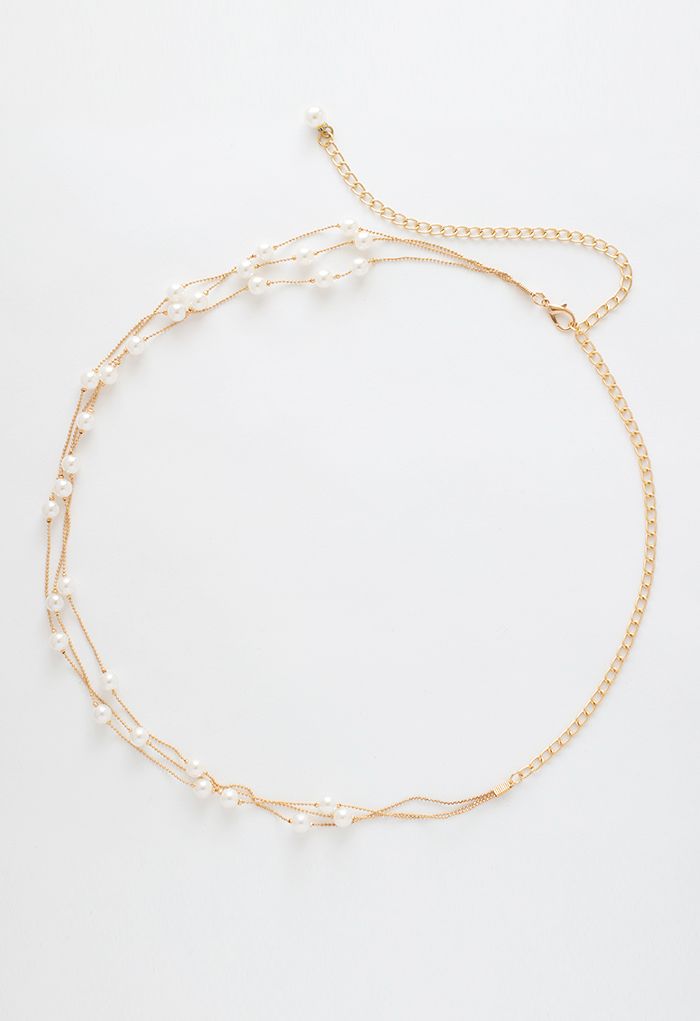Cintura a catena dorata con strati di perle