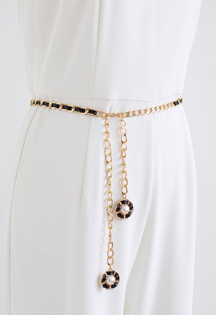 Cintura a catena dorata in ecopelle con perle floreali in nero