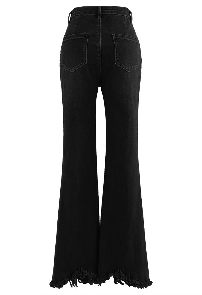 Jeans svasati con tasca classica con orlo nappa in nero