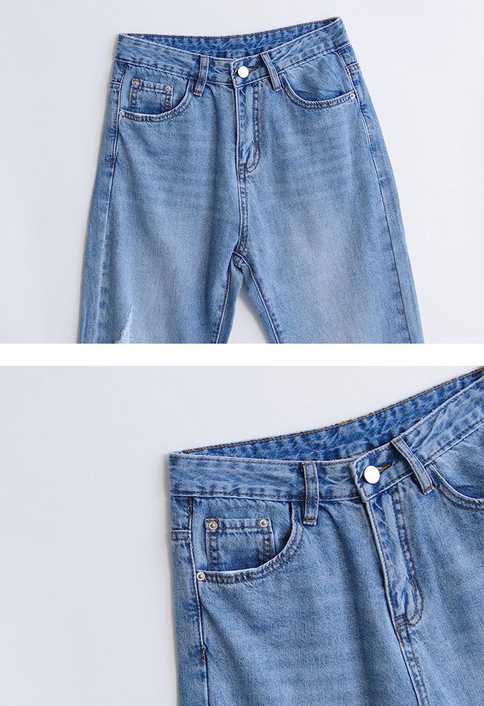 Jeans a vita alta con dettagli strappati