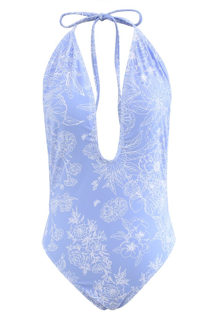 Costume da bagno con schiena scoperta con disegno floreale in blu