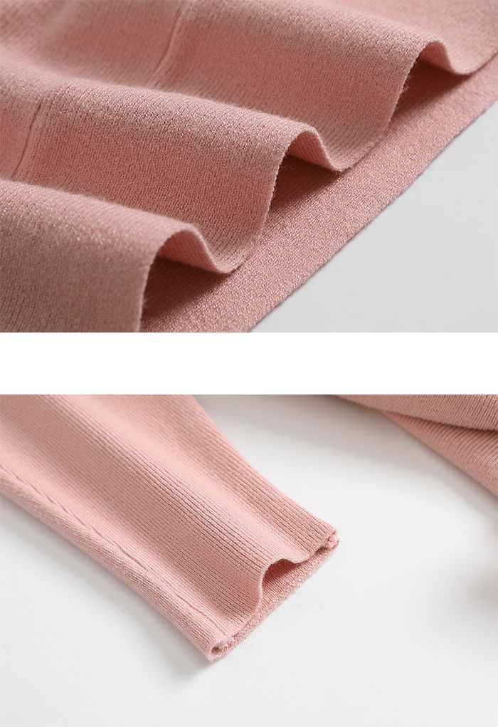 Maglione oversize con fiocco e maniche a pipistrello in rosa