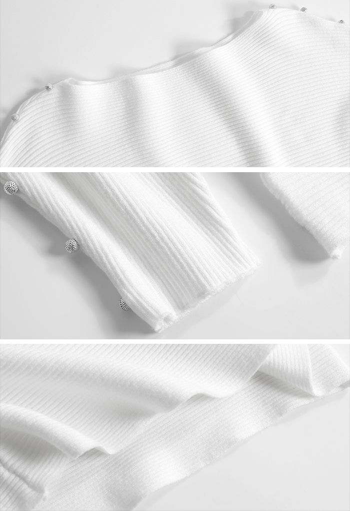 Maglione in maglia bianco con maniche a pipistrello perlato