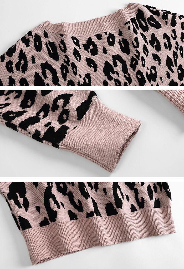Maglione rosa con maniche a pipistrello in jacquard leopardato