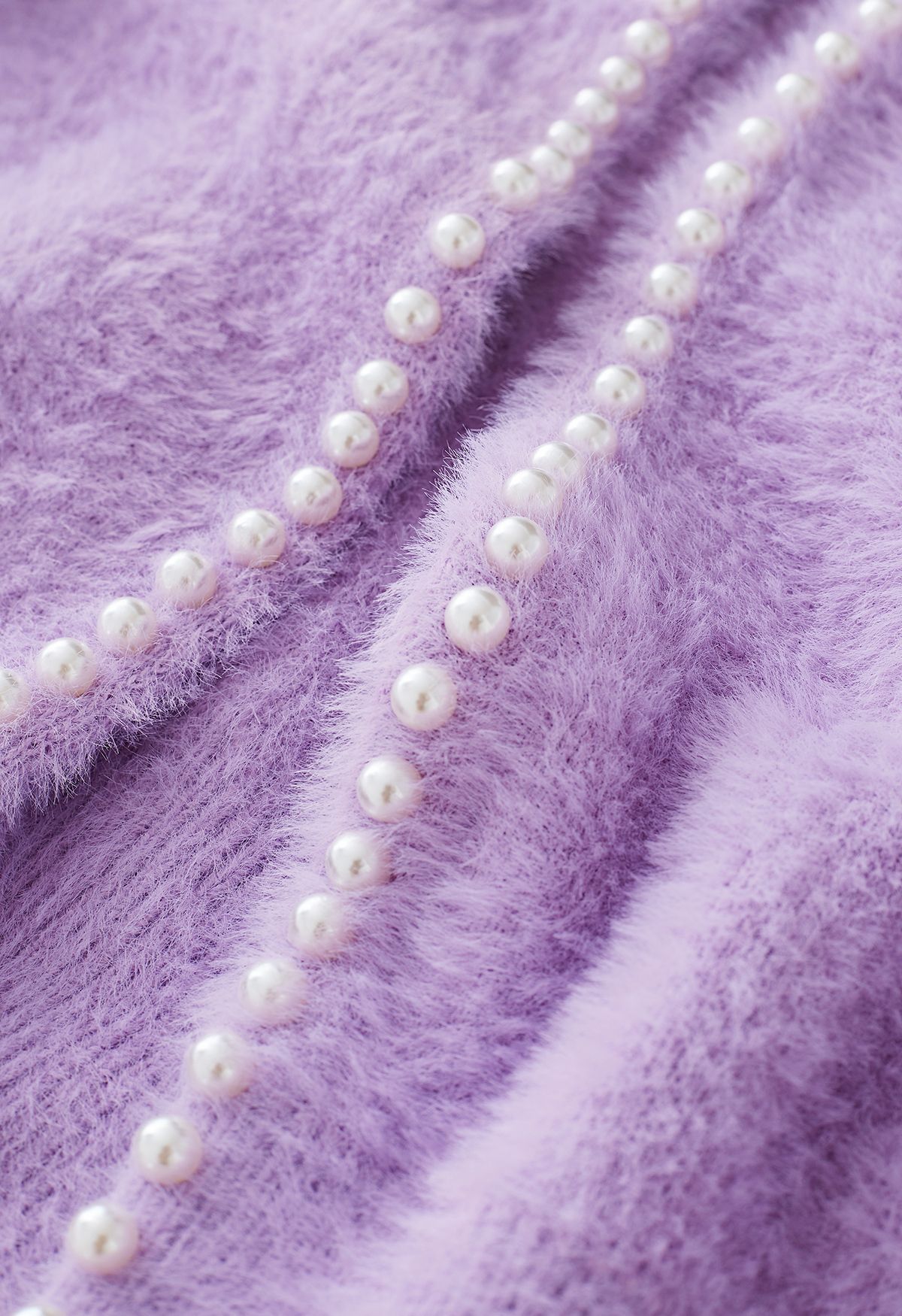 Cardigan in maglia fuzzy perlato aperto sul davanti in lilla