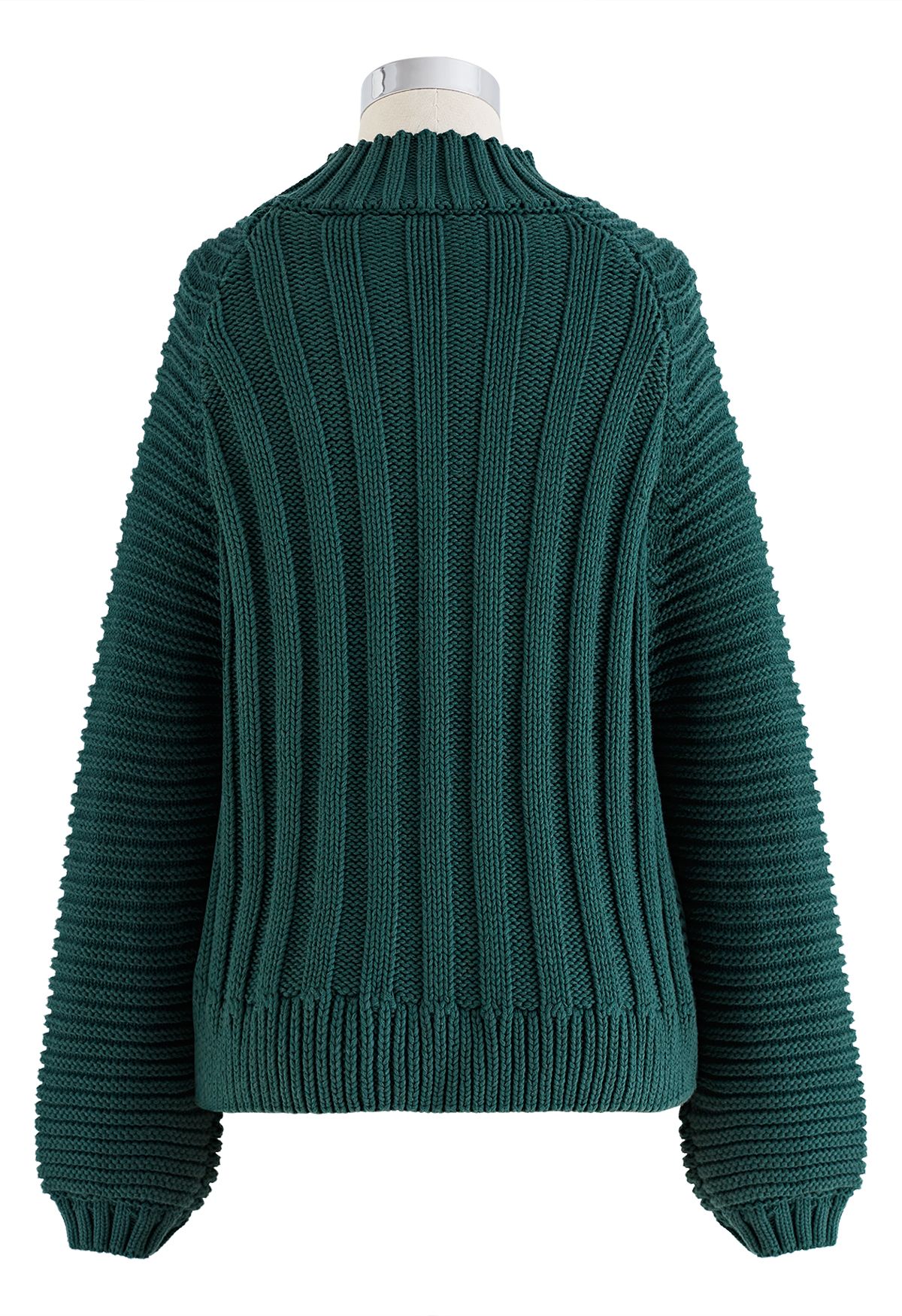 Maglione corto in maglia pesante a collo alto a coste esagerate in verde scuro