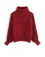 Maglione in maglia a collo alto con frange in rosso