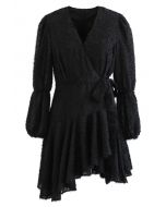 Mini abito asimmetrico con fiocco avvolto fuzzy in nero