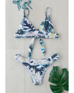 Set bikini con foglie tropicali