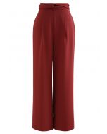 Pantaloni comodi con drappeggio a nastro incrociato in rosso ruggine