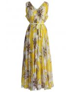 Meraviglioso vestito lungo in chiffon floreale in giallo